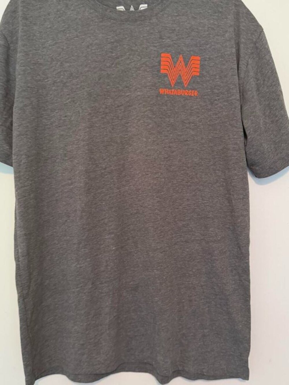 Gray Whataburger t-shirt with orange logo, size M